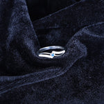 Load image into Gallery viewer, Women's Silver Wave Ring with Blue Sapphire Accent – Elegant &amp; Minimalist Design

