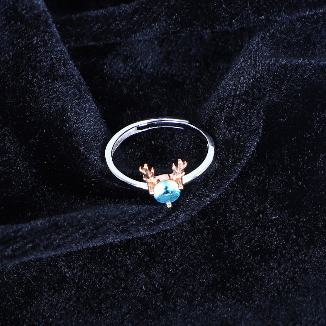 Women's Whimsical Blue Gemstone Ring with Rose Gold Antler Accents