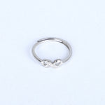 Load image into Gallery viewer, Women's Infinity Knot Ring – Dainty Silver Band with Cubic Zirconia Accents
