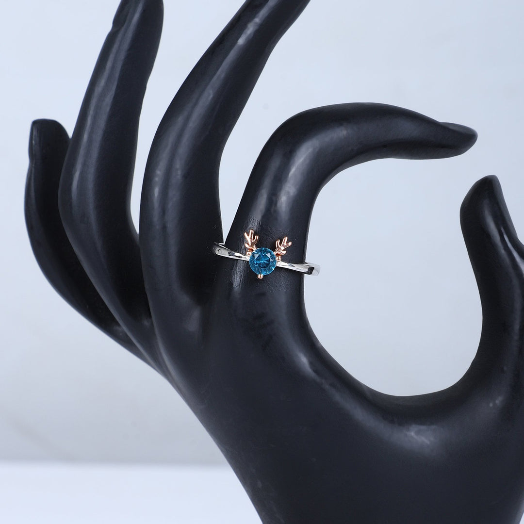 Women's Whimsical Blue Gemstone Ring with Rose Gold Antler Accents