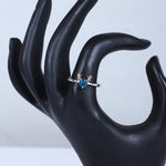 Load image into Gallery viewer, Women's Whimsical Blue Gemstone Ring with Rose Gold Antler Accents
