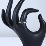 Load image into Gallery viewer, Women's Silver Wave Ring with Blue Sapphire Accent – Elegant &amp; Minimalist Design
