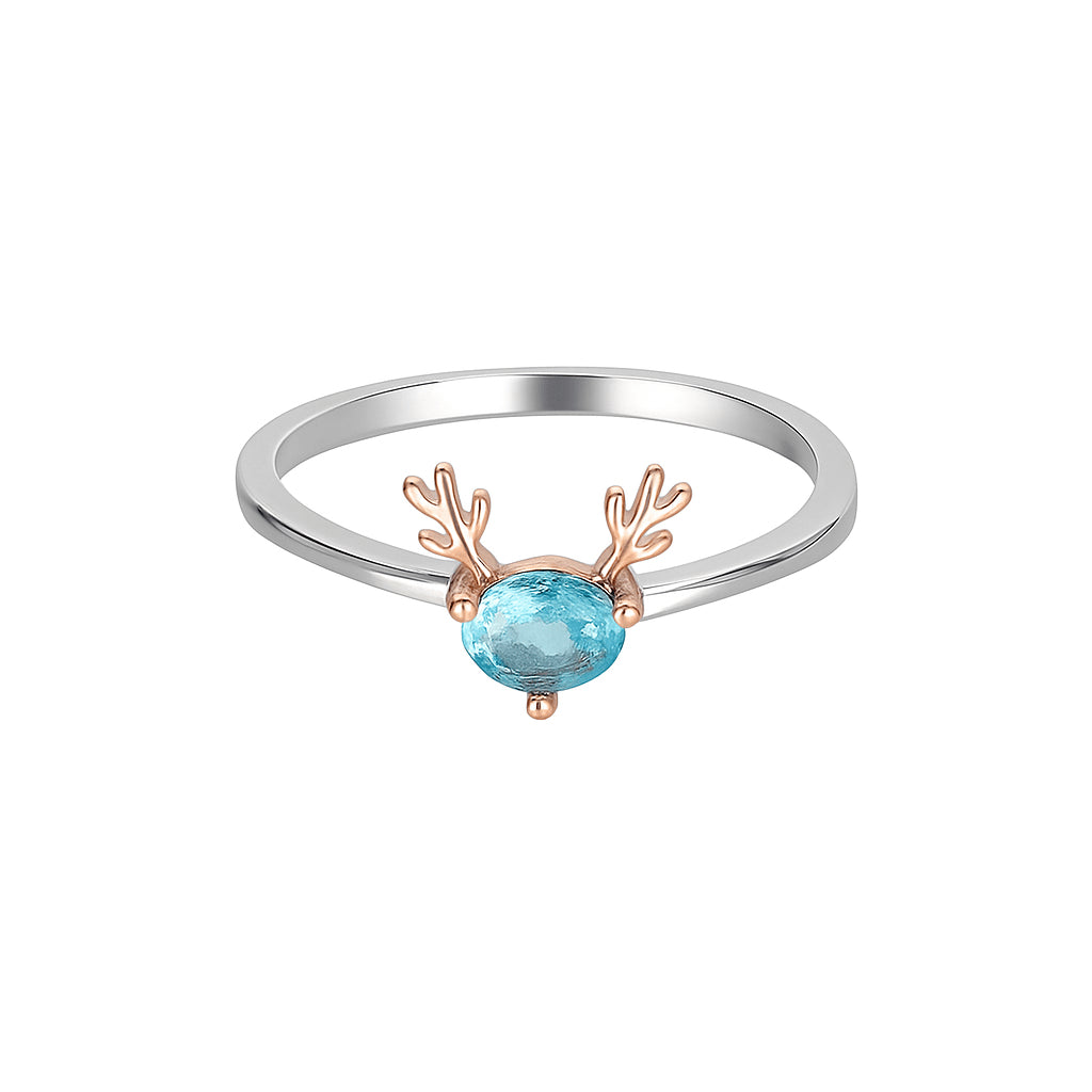 Women's whimsical blue gemstone ring with rose gold antler accents