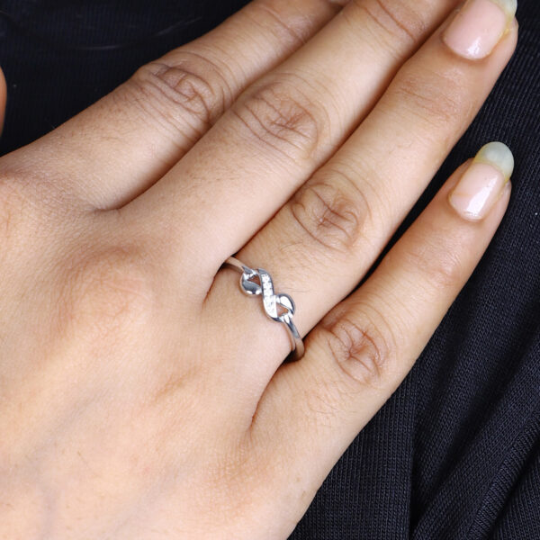 Women's Infinity Knot Ring – Dainty Silver Band with Cubic Zirconia Accents - Image 3