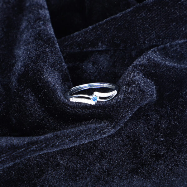 Women's Silver Wave Ring with Blue Sapphire Accent – Elegant & Minimalist Design - Image 2