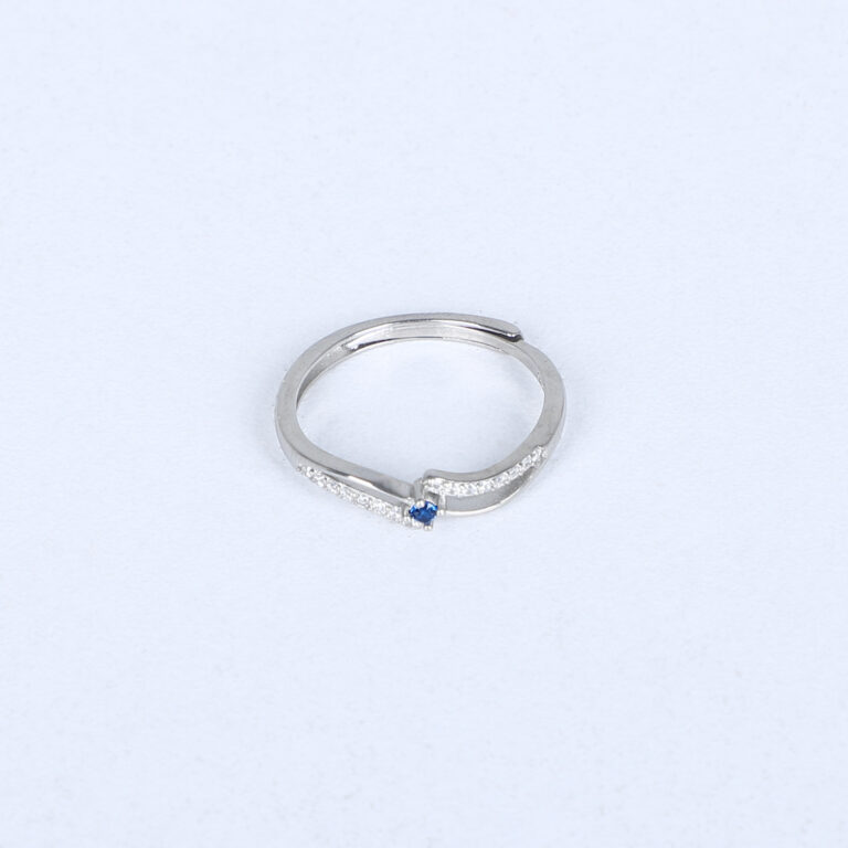 Women’s Silver Wave Ring with Blue Sapphire Accent – Elegant & Minimalist Design