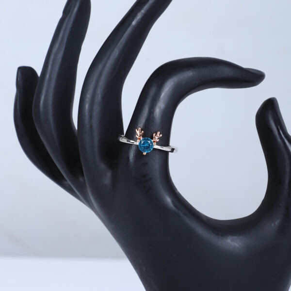 Women's Whimsical Blue Gemstone Ring with Rose Gold Antler Accents - Image 3