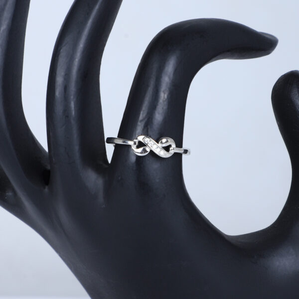 Women's Infinity Knot Ring – Dainty Silver Band with Cubic Zirconia Accents - Image 2